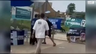 ישראלים מתחילים להתנגח זה בזה בדוכני ההצבעה נמשך גם מסע עצום של התלהמות והסתה נגד פלסטינים אזרחי ישראל. נתנ…