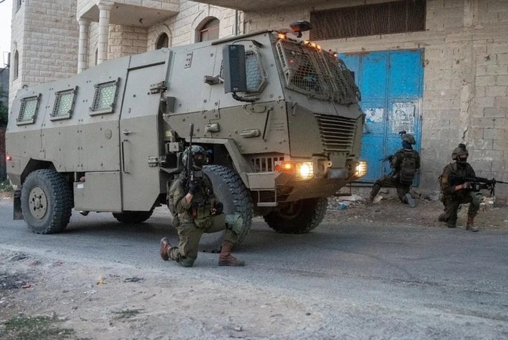 Israeli forces conduct arrest sweeps across West Bank, seal roads