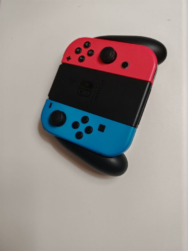 Продам игровые контроллеры и базовую станцию Nintendo Switch — фото 1