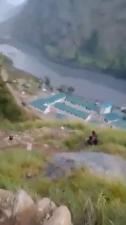 A terrible mud flood swallows dozens of houses and bridges before the eyes of residents in the Gorkha region of Nepal