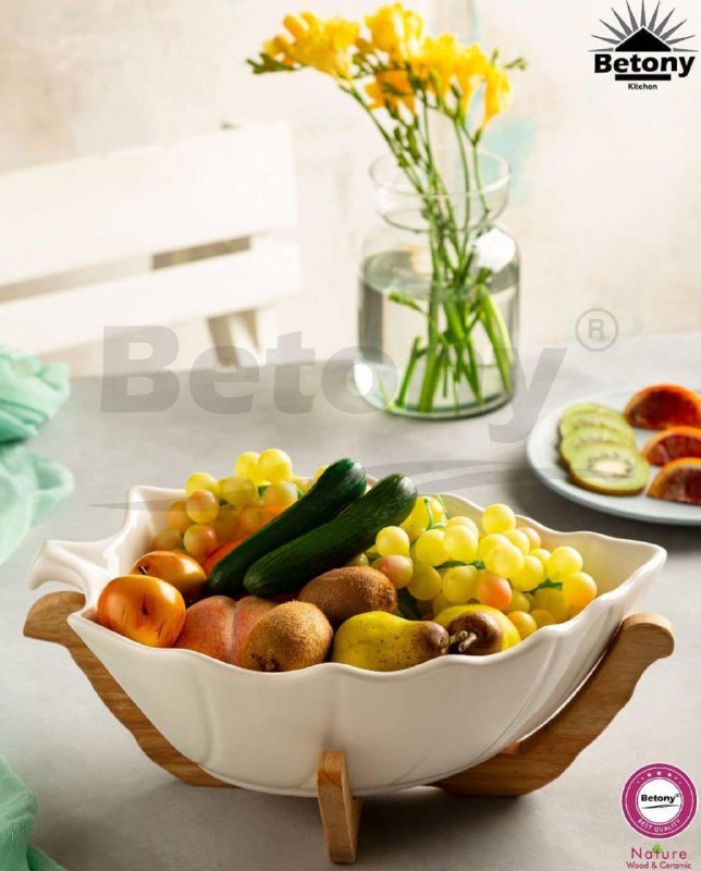 Betony shop 55183773 (میرزاحسین)تولید و پخش: کاسه میوه خوری برگ کشتی زیرچوب Betonyابعاد ۲۴ در ۱۸ سانت ارتفاع ۶ سانتکارتن ۱۲ عددیدارای جعبه تکجنس: چینی و چوب طبیعیمنا
