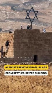 Activists remove Israeli symbols from settler-occupied Bethlehem building
