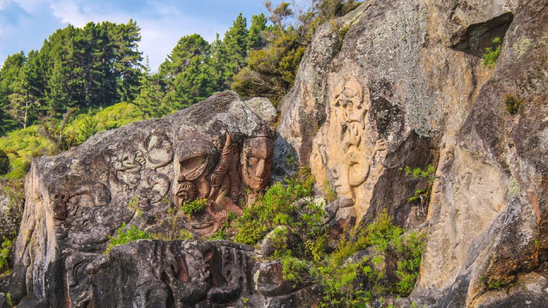 Honoring Indigenous voicesNgātoroirangi Mine Bay Māori Rock Carvings on Lake Taupō, New Zealand (© Joppi/Getty Images)