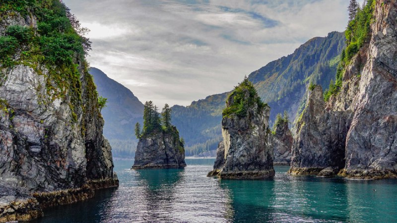 Rugged peaks and wild watersSpire Cove in Kenai Fjords National Park, Seward, Alaska (© Wander Photography/Getty Images)