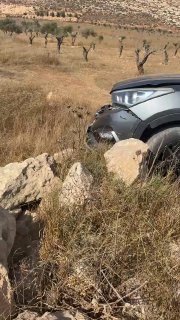 Settlers attack vehicle on road north of Ramallah, causing it to flip.