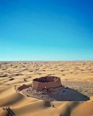 Built over 1,000 years ago in the dead center of an ocean of sand dunes, nobody actually knows who constructed this circular fortress.