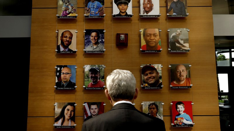 An exhibit honoring victims of gun violence is taken down at ATF headquarters