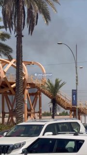 ערימות עשן עולות על הגישות לאזור אל-שלג'יה בבגדד