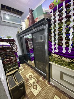 Inside Kibray agricultural zone, on the new road, located in the mahalla