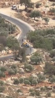 Professionally...a young man survives and manages to evade the settler militias that attack him while driving an agricultural tractor in the village of al-Mujir, northeast of Ramallah.