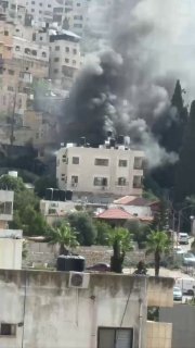 ממקום ההפצצה והמשך הצפיפות של כוחות הכיבוש הישראליים בסביבת בית החולים הלאומי במרכז שכם.