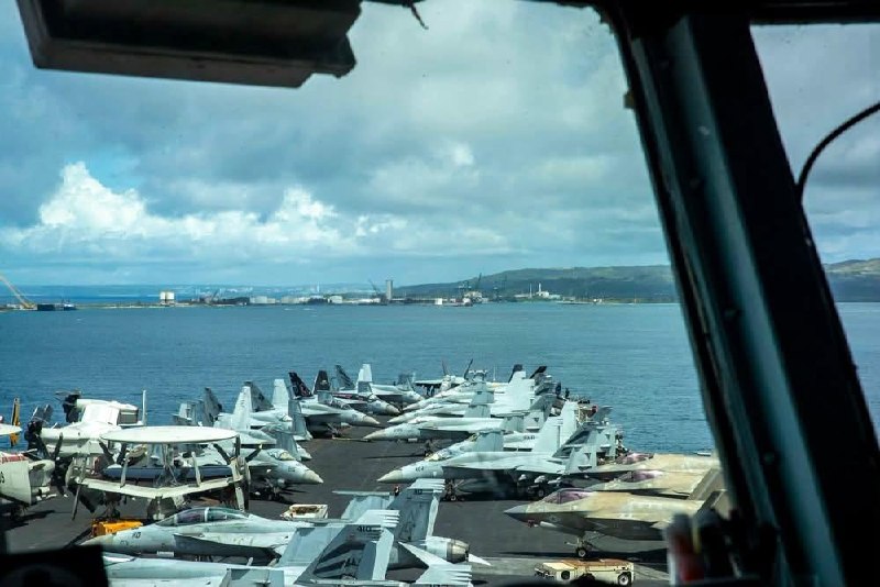 The US Navy aircraft carrier USS Abraham Lincoln (CVN-72) arrived in Guam on September 19 for a logistics stop after 302 days of deployment.