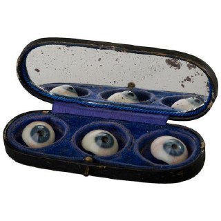 Three spare glass eyes in a case, France, early 20th century.Time Machine | Historical Photo