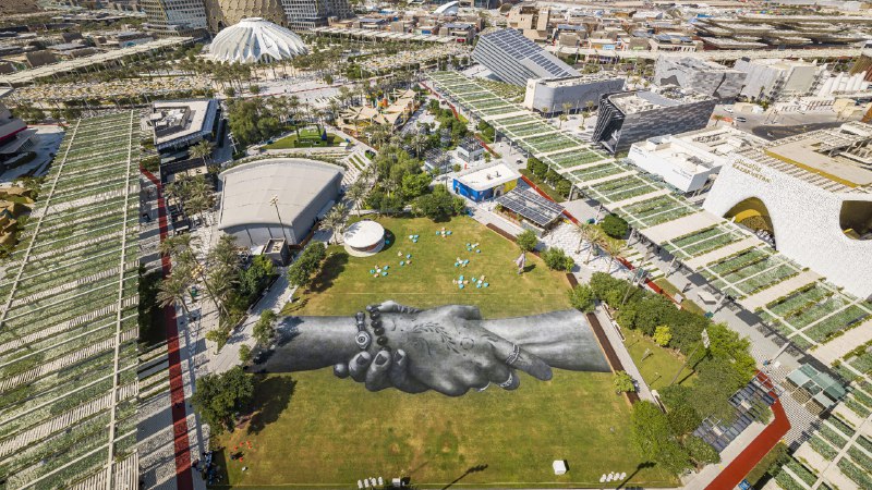 Friendship without borders'Beyond Walls' land-art installation by Saype at Expo 2020 Dubai, United Arab Emirates (© VALENTIN FLAURAUD/EPA-EFE/Shutterstock)