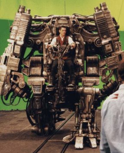 把宇树这玩意做大一点中间弄个座，人坐里面，用动捕+摇杆控制机器人这玩意不就是