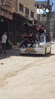 מחנה קיץ בעזה: ילדים מתאמנים בנשק וברכב ישראלי שבוי