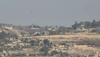 🚨 An Israeli drone drops gallons of explosives on houses in Bnei Hayin.
