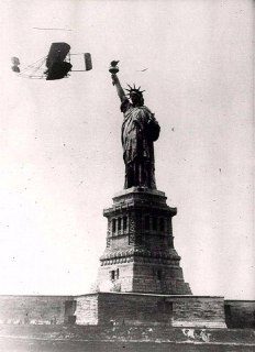 Demonstration flight around the Statue of Liberty by Wilbur Wright in his Model A airplane. September 28, 1909.Time Machine | Historical Photo