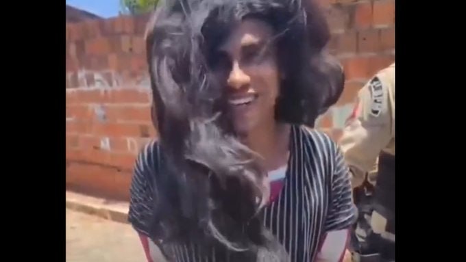 Brazilian police said Friday they had captured a suspected serial killer linked to at least 16 deaths since May, who was arrested disguised as a woman and carrying a baby.