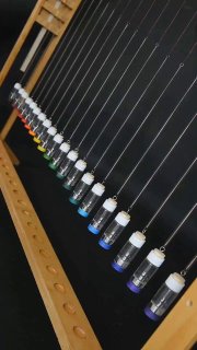 Cleaning a machine's electrical cabinet using deionized water is possible, but extreme caution is required.