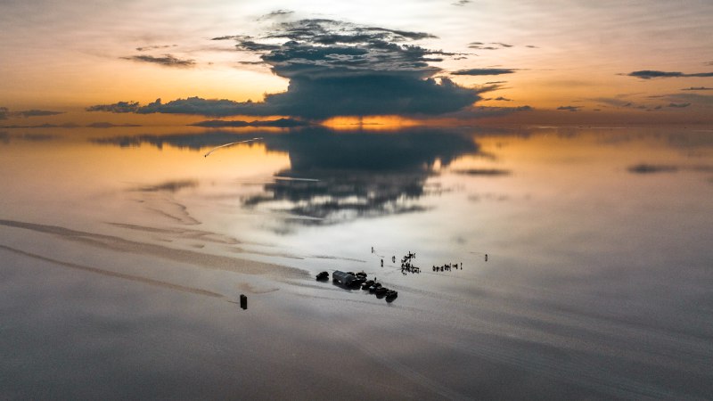 Salt, sky, and the stillness betweenSalar de Uyuni salt flats in Bolivia (© Abstract Aerial Art/Getty Images)