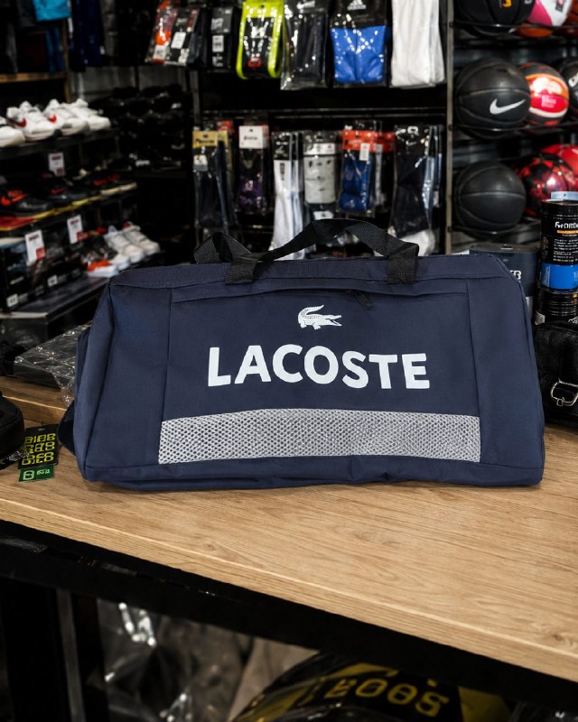 فروشگاه تخفیفی آنلاین: ⚽️ساک ورزشی LACOSTE ( سورمه ای)کد6583⚽️ جنس : ریپس (ترکیب پلی استر_نایلون)⚽️ دارای بند دوشی قابل تنظیم و جدا شونده⚽️ طول