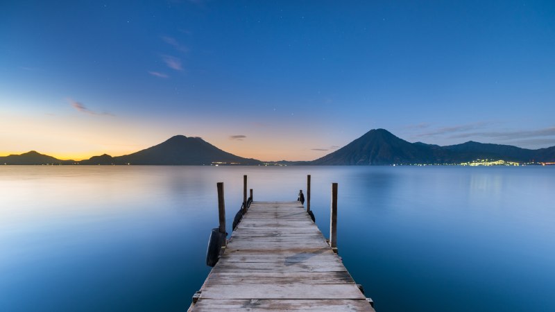 Echoes of a volcanic pastSunrise at Lake Atitlán, Guatemala (© shayes17/Getty Images)