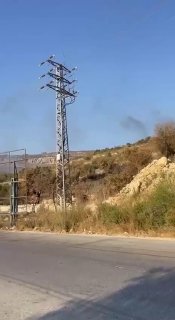 מתנחלים שורפים עצי זית ליד הכפר עין סיניה מצפון לרמאללה.