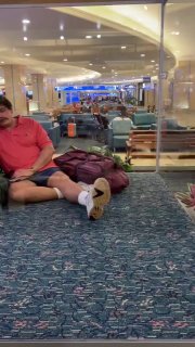 A hyper-realistic statue of a sleeping 💤 man in Orlando International Airport, named 'The Traveler', that has been there since 1985. 🛬Did you know? 🎓