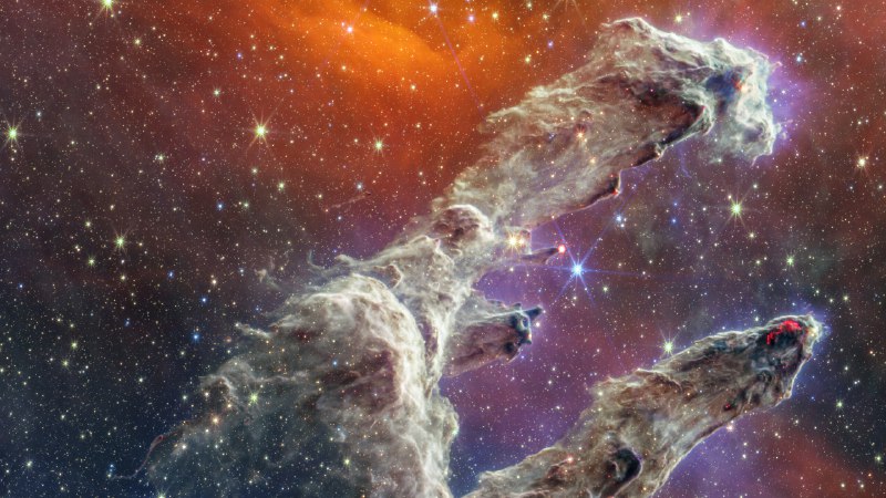 Universe in bloomThe Pillars of Creation viewed by the James Webb Space Telescope (© NASA)