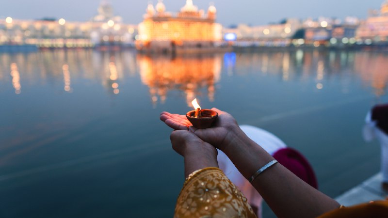 Glowing traditionsA diya at the Golden Temple during Diwali, Amritsar, India (© EyeEm Mobile GmbH/Getty Images)