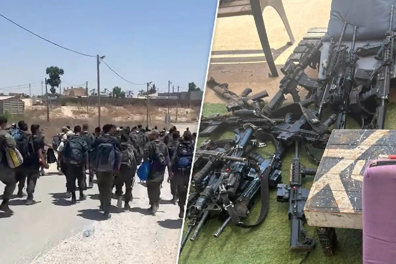 נסיגה המונית של יותר מ-100 שבויים צבאיים ישראלים מהצריפים והנחת הנשק שלהם בצד.