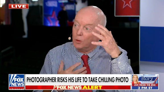 Photographer wins Pulitzer for iconic photo of bullet speeding by Trump's head during assassination attempt