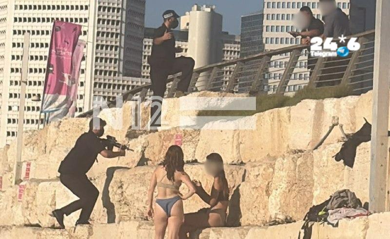 🇮🇱 תיעוד: מאבטחי ראש הממשלה פינו את המתרחצים מהחוף עם נשקים לפני הגעתו לנאום על האלטלנה.