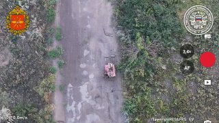 🇷🇺🇺🇦️ - The NRTK Courier unmanned ground vehicle (UGV), equipped with mine clearance rollers, evacuates a wounded soldier from forward positions after clearing a mine route.