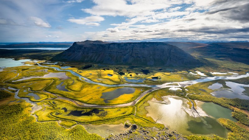 The quiet power of an unclaimed worldView from Skierffe Mountain over the Rapadalen river delta, Sarek National Park, Laponia, Lapland, Sweden (© Robert Haasmann/Getty Images)