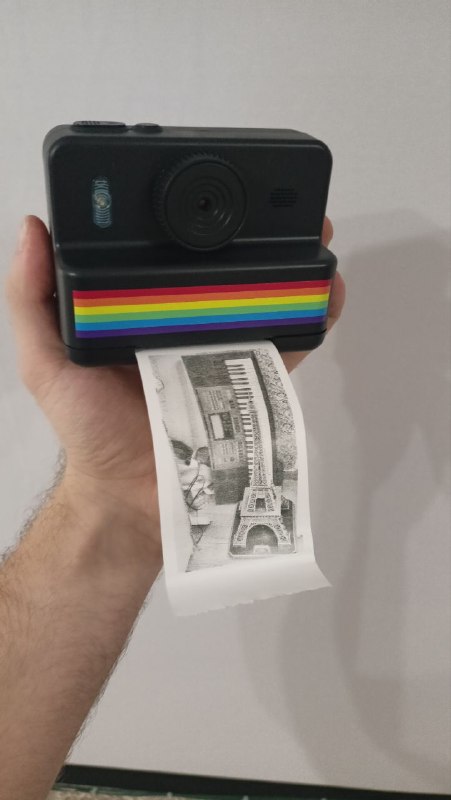 Фотоаппарат,. который печатает на чековой бумаге