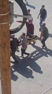 Using an olive "ladder"... evacuation of a farmer who was injured as a result of an attack by settler militias on his land in the village of Osarin, south of Nablus.