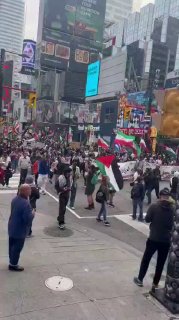 Canadians march with the flags of Palestine and Iran