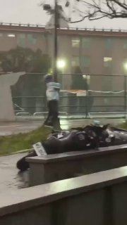 In Taiwan, a strong typhoon almost took a person.