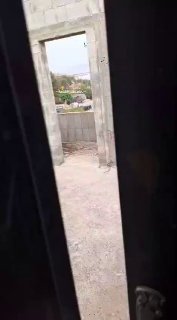 דחפור צה"ל הורס כעת את בניין הנפגעים בבית פוריק.