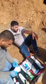 Covered in his blood... a young man was wounded by live bullets and beaten after settlers attacked him on his land in the town of Deir Abu Mashal, west of Ramallah.