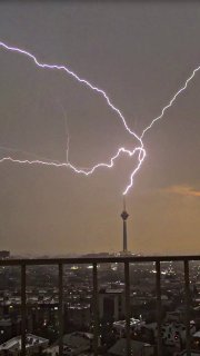 Tehran, tonight: Milad Tower is struck by lightning.