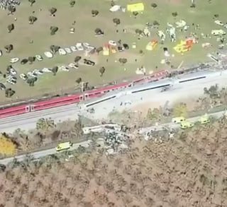 ספרד סצינות אוויריות מדגישות את היקף ההרס באתר של תאונת רכבת שהרשויות תיארו כ"טרגיות" ביו.קישור/alghadeertv