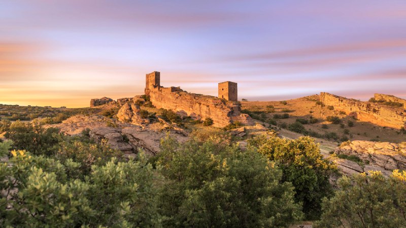 Castle on a cragCastle of Zafra, Guadalajara province, Spain (© Eduard Gene/Getty Images)
