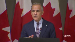 Canadian Prime Minister Mark Carney does Trump's "accordion hands" move, drawing laughs from the Canadian media.