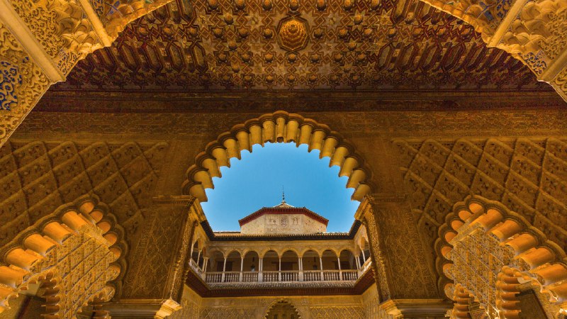 The splendor of SevilleCourtyard of the Maidens, Alcázar of Seville, Spain (© Danny Lehman/Getty Images)