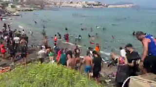 גבול פרוץ: 50 אלף מהגרים הסתננו לאירופה ביממה >>