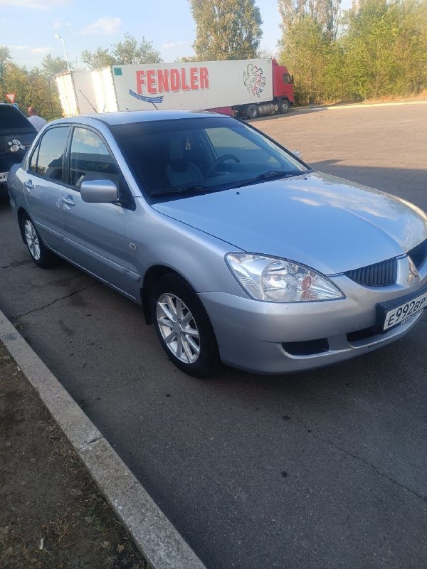 Mitsubishi lanсer 9 2005 года 1,6 бeнзин автомат πpобeг 278т. км цeна: 330.000 тыс. тоpг у капота вс... - фотография