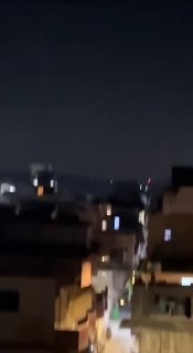 טנק מרכבה ישראלי מכוון את העיירה מג'דל זון